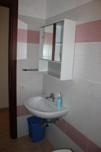 Koupelna v ubytování Casa per Ferie Beato Rosaz + 51 fotografií