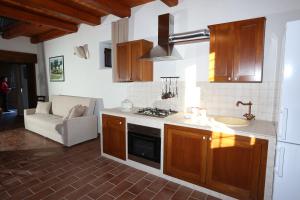 A kitchen or kitchenette at Serravalle Relais & Country Villa with private pool - Esclusive use