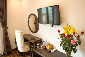 TV a/nebo společenská místnost v ubytování Sapa Wings Hotel