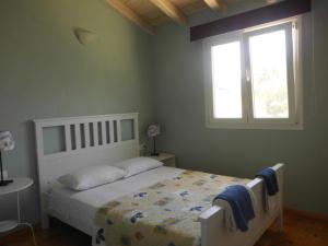 Postel nebo postele na pokoji v ubytování Shambala Apartments + 37 fotografií
