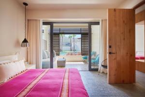 Ένα ή περισσότερα κρεβάτια σε δωμάτιο στο Hotel San Cristobal Adults 15+