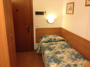 Postel nebo postele na pokoji v ubytování Hotel Tirreno