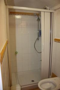 a bathroom with a shower with a toilet and a sink at Casa Reginella - Borgo Marinaro in Conca dei Marini