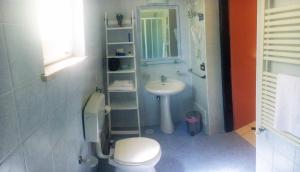 a bathroom with a toilet and a sink at B&B Villa Giglio in Catanzaro +51 photos