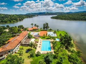 an aerial view of a resort on the river at Hotel Lago do Sol in Itaúna