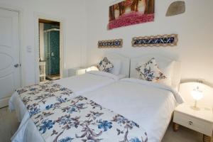 Een bed of bedden in een kamer bij Lodos Butik Hotel