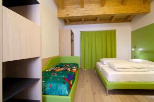 Postel nebo postele na pokoji v ubytování Agritur I Colori