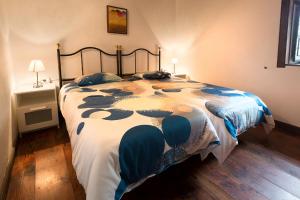 Säng eller sängar i ett rum på Casitas Rurales Huerto Conejo