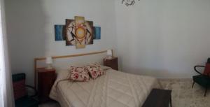 Кровать или кровати в номере Casa Bilu'