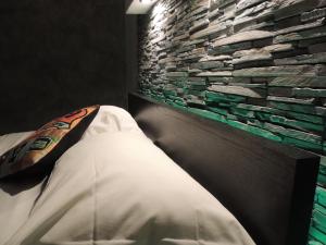 A bed or beds in a room at Double B Ferruccio I