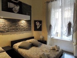 A bed or beds in a room at Double B Ferruccio I