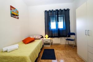 A bed or beds in a room at Apartment Iva