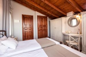 Postel nebo postele na pokoji v ubytování My Villa Dafni