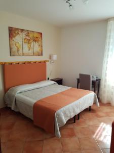 Postel nebo postele na pokoji v ubytování B&B La Casa Di Zefiro
