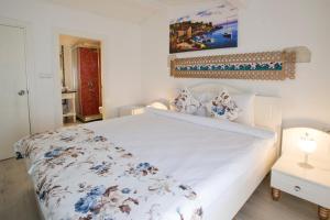 Ένα ή περισσότερα κρεβάτια σε δωμάτιο στο Lodos Butik Hotel