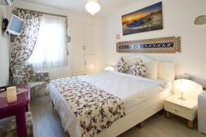 Een bed of bedden in een kamer bij Lodos Butik Hotel