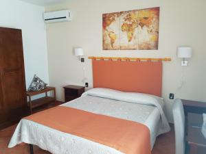 Postel nebo postele na pokoji v ubytování B&B La Casa Di Zefiro