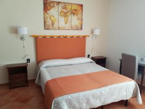 Postel nebo postele na pokoji v ubytování B&B La Casa Di Zefiro