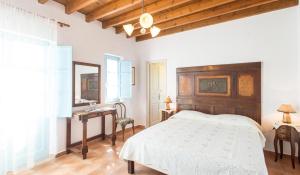 A bed or beds in a room at Villa Patmos Netia