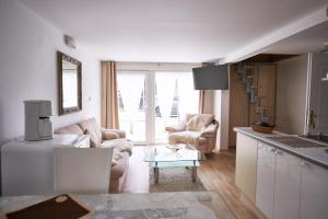 Posezení v ubytování Bluestars Apartments
