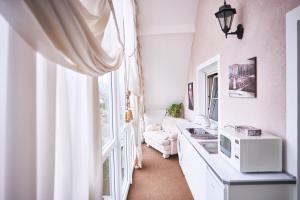 Kuchyň nebo kuchyňský kout v ubytování Bluestars Apartments