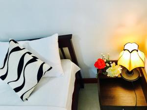 Aerizo bungalow & Tours客房内的一张或多张床位