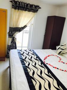 Aerizo bungalow & Tours客房内的一张或多张床位