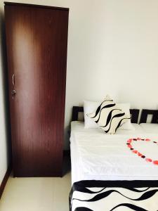 Aerizo bungalow & Tours客房内的一张或多张床位