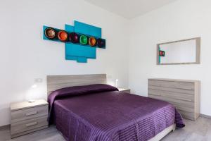 Posteľ alebo postele v izbe v ubytovaní Cosy Torri Apartments