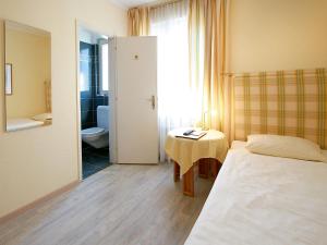 Postelja oz. postelje v sobi nastanitve Hotel Garni Golf