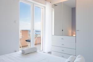 Posteľ alebo postele v izbe v ubytovaní Panorama Holidays