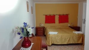 Voodi või voodid majutusasutuse Hotel Paese Corvara toas