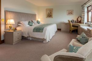 Een bed of bedden in een kamer bij Ael y Bryn Luxury B&B, North Pembrokeshire