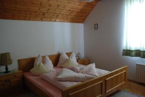 Postel nebo postele na pokoji v ubytování Haus Grundner