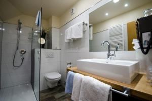 Ein Badezimmer in der Unterkunft Birkhofer See genießen - Aparthotel am Bodensee