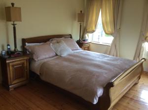 Postel nebo postele na pokoji v ubytování Keyfield House