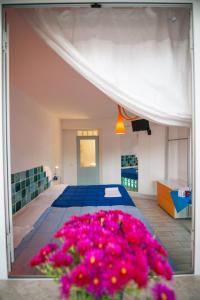 Letto o letti in una camera di Suite House L'Isola Che Non C'è