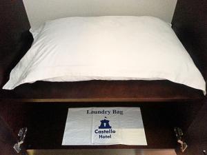 Postel nebo postele na pokoji v ubytování Castello Hotel