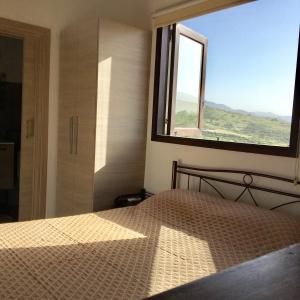 Postel nebo postele na pokoji v ubytování Xenios Guesthouse