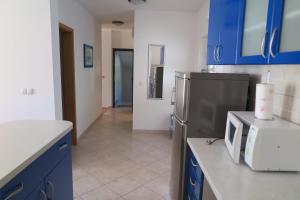 Kuchyň nebo kuchyňský kout v ubytování Apartments Kovacic
