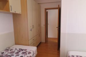 Postel nebo postele na pokoji v ubytování Apartments Kovacic