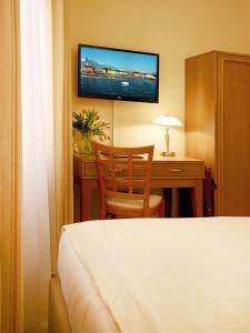 Postelja oz. postelje v sobi nastanitve Hotel Garni Golf