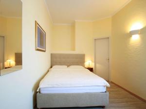 Postelja oz. postelje v sobi nastanitve Hotel Garni Golf