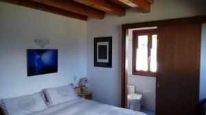 Giường trong phòng chung tại Villa Genziana