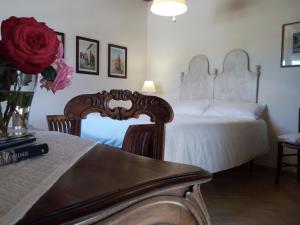 Postel nebo postele na pokoji v ubytování Monte Atena B&B di Charme