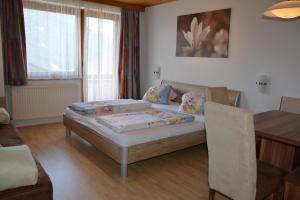 Posteľ alebo postele v izbe v ubytovaní Appartement Haus Gatterer