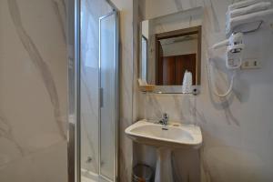 Kúpeľňa v ubytovaní Hotel Universo