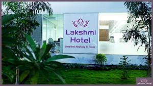 Sertifikat, nagrada, logo ili drugi dokument prikazan u objektu Lakshmi Hotel