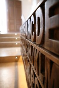 a close up of a wall of wood at Anagram Hotel in M&yacute;konos City