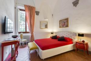 A bed or beds in a room at Residenza d'Epoca Galleria dell'Accademia